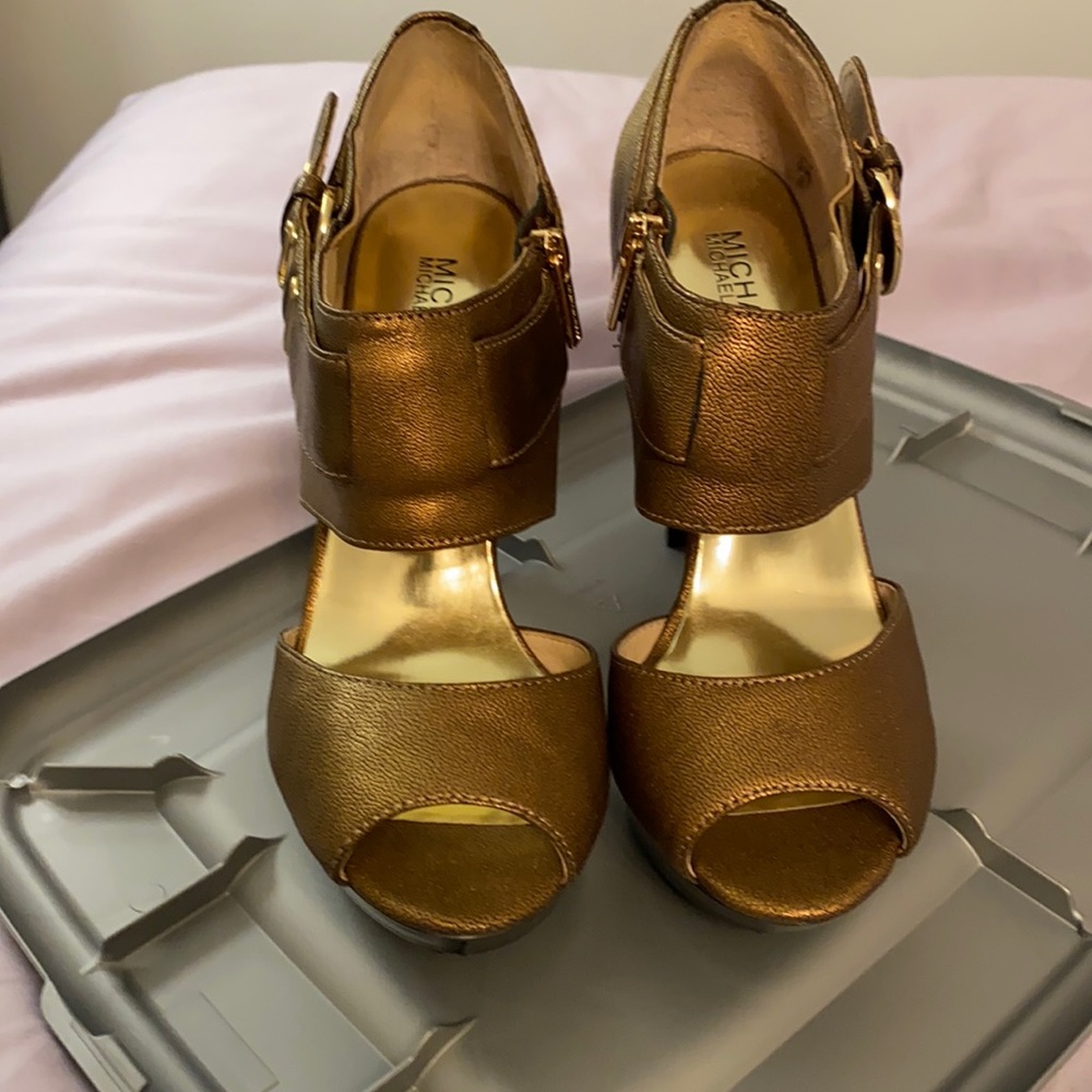 Beautiful gold leather platform with black heel